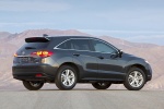 Picture of a 2015 Acura RDX in Graphite Luster Metallic from a rear three-quarter perspective