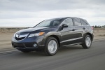 Picture of a driving 2015 Acura RDX in Graphite Luster Metallic from a front left perspective