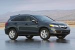 Picture of a 2015 Acura RDX in Graphite Luster Metallic from a front three-quarter perspective
