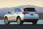 Picture of a 2015 Acura RDX in Silver Moon from a rear three-quarter perspective