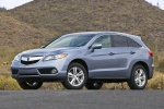 Picture of a 2015 Acura RDX in Forged Silver Metallic from a front three-quarter perspective