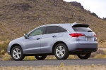 Picture of a 2015 Acura RDX in Forged Silver Metallic from a rear left perspective