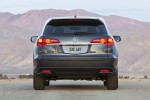 Picture of a 2015 Acura RDX in Graphite Luster Metallic from a rear perspective