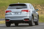 Picture of a driving 2018 Acura RDX AWD in Lunar Silver Metallic from a rear right perspective