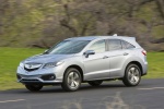 Picture of a driving 2018 Acura RDX AWD in Lunar Silver Metallic from a front left three-quarter perspective