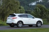 Picture of a 2019 Acura RDX SH-AWD in White Diamond Pearl from a rear right three-quarter perspective