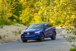 Picture of a driving 2019 Acura RDX A-Spec Package SH-AWD in Apex Blue Pearl from a front left perspective
