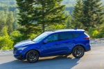 Picture of a driving 2019 Acura RDX A-Spec Package SH-AWD in Apex Blue Pearl from a side perspective