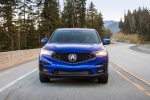 Picture of a driving 2020 Acura RDX A-Spec Package SH-AWD in Apex Blue Pearl from a frontal perspective