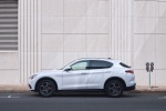 Picture of a 2018 Alfa Romeo Stelvio Ti Lusso AWD in Trofeo White Tri-Coat from a side perspective