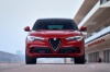 Picture of a 2020 Alfa Romeo Stelvio Quadrifoglio AWD in Rosso Competizione Tri-Coat from a frontal perspective