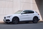 Picture of a 2020 Alfa Romeo Stelvio Ti Lusso AWD in Alfa White from a front left three-quarter perspective