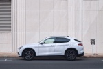 Picture of a 2020 Alfa Romeo Stelvio Ti Lusso AWD in Alfa White from a side perspective