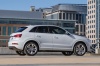 Picture of a 2015 Audi Q3 2.0T in Cortina White from a right side perspective