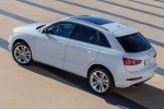 Picture of a 2015 Audi Q3 2.0T in Cortina White from a rear left three-quarter top perspective