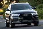 Picture of a driving 2016 Audi Q3 2.0T quattro in Brilliant Black from a front right perspective