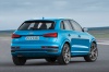 Picture of a 2017 Audi Q3 in Hainan Blue Metallic from a rear right three-quarter perspective