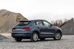 Picture of a 2017 Audi Q3 in Utopia Blue Metallic from a rear right three-quarter perspective