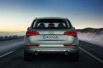 Picture of a driving 2015 Audi Q5 2.0 TFSI Quattro in Cuvee Silver Metallic from a rear perspective