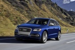 Picture of a driving 2015 Audi SQ5 Quattro in Scuba Blue Metallic from a front left three-quarter perspective