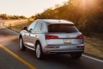 Picture of a driving 2018 Audi Q5 quattro in Florett Silver Metallic from a rear left perspective