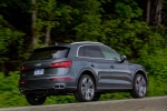 Picture of a driving 2018 Audi SQ5 quattro in Daytona Gray Pearl Effect from a rear right three-quarter perspective