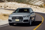 Picture of a driving 2018 Audi Q5 quattro in Florett Silver Metallic from a front left perspective