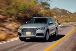 Picture of a driving 2018 Audi Q5 quattro in Florett Silver Metallic from a front left three-quarter perspective
