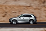 Picture of a driving 2020 Audi Q5 45 TFSI quattro in Florett Silver Metallic from a left side perspective