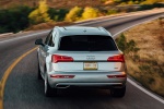 Picture of a driving 2020 Audi Q5 45 TFSI quattro in Florett Silver Metallic from a rear perspective