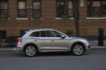 Picture of a driving 2020 Audi Q5 45 TFSI quattro in Florett Silver Metallic from a right side perspective