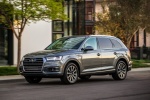 Picture of a driving 2017 Audi Q7 3.0T quattro in Graphite Gray Metallic from a front left three-quarter perspective