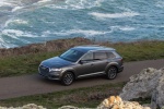 Picture of a driving 2017 Audi Q7 3.0T quattro in Graphite Gray Metallic from a front left three-quarter top perspective