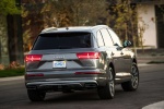 Picture of a driving 2017 Audi Q7 3.0T quattro in Graphite Gray Metallic from a rear right perspective