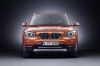 Picture of a 2015 BMW X1 in Valencia Orange Metallic from a frontal perspective