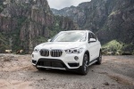 Picture of a 2017 BMW X1 xDrive28i in Alpine White from a front left perspective
