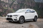 Picture of a 2017 BMW X1 xDrive28i in Alpine White from a front left three-quarter perspective
