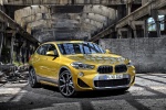 Picture of a 2018 BMW X2 in Galvanic Gold Metallic from a front right perspective