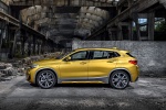 Picture of a 2018 BMW X2 in Galvanic Gold Metallic from a side perspective
