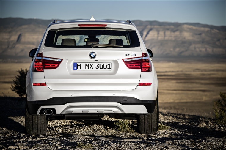 Picture of a 2015 BMW X3 in Mineral White Metallic from a rear perspective