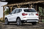 Picture of a 2015 BMW X3 in Mineral White Metallic from a rear left three-quarter perspective