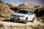 Picture of a driving 2017 BMW X3 in Mineral White Metallic from a front left three-quarter perspective