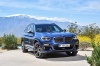 Picture of a 2018 BMW X3 M40i in Phytonic Blue Metallic from a front right perspective