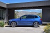 Picture of a 2018 BMW X3 M40i in Phytonic Blue Metallic from a side perspective