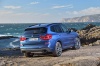 Picture of a 2018 BMW X3 M40i in Phytonic Blue Metallic from a rear right three-quarter perspective