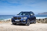 Picture of a 2018 BMW X3 M40i in Phytonic Blue Metallic from a front left perspective
