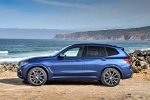 Picture of a 2018 BMW X3 M40i in Phytonic Blue Metallic from a left side perspective
