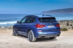 Picture of a 2018 BMW X3 M40i in Phytonic Blue Metallic from a rear left perspective