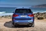 Picture of a 2019 BMW X3 M40i in Phytonic Blue Metallic from a rear perspective