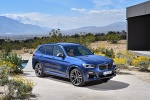 Picture of a 2019 BMW X3 M40i in Phytonic Blue Metallic from a front right three-quarter perspective